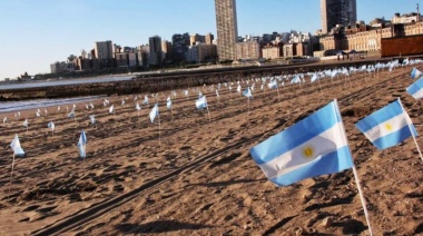 En playas marplatenses homenajearon a víctimas de Covid-19 con 504 banderas nacionales